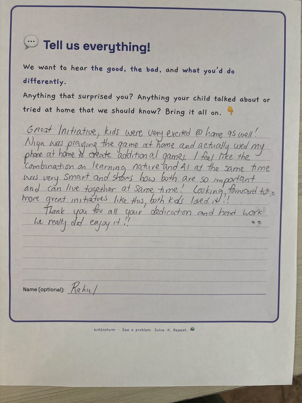 Handwritten parent feedback card: great initiative — she used my phone at home to create additional games