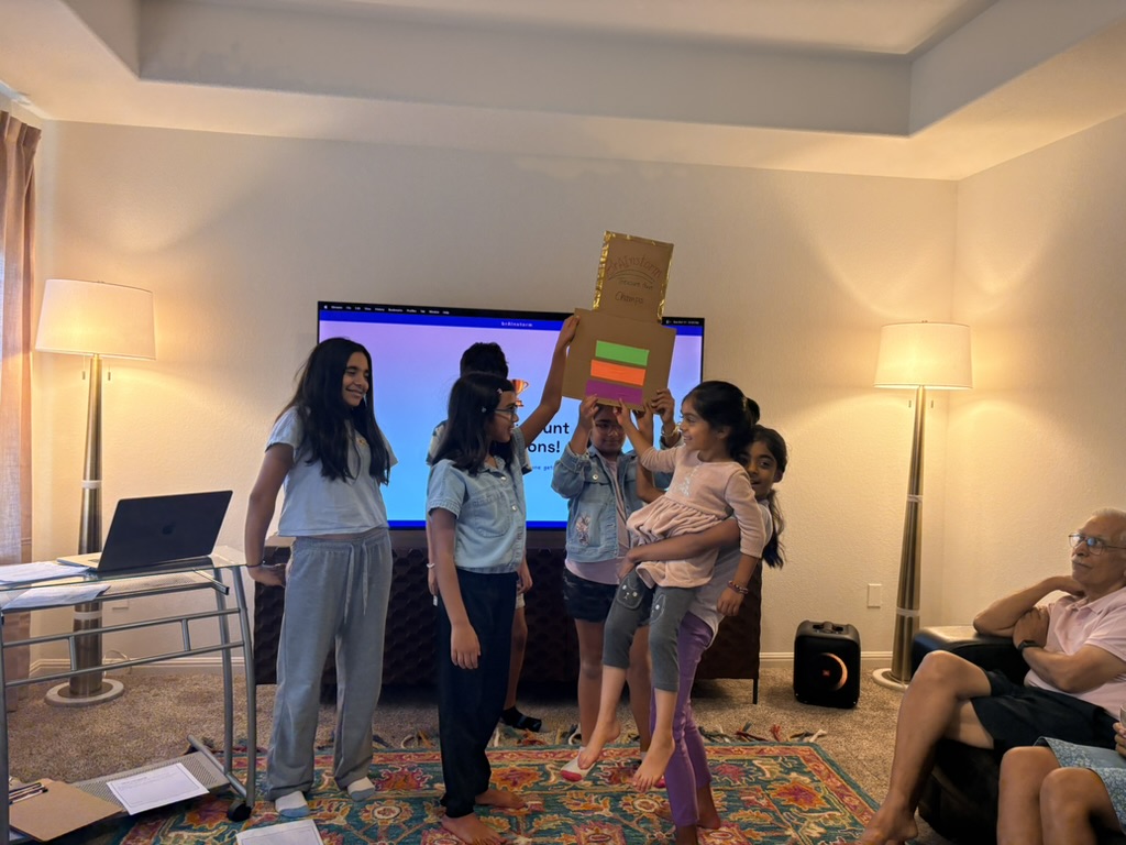 Treasure Hunt champions holding the trophy